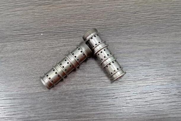 看高速磨粒流是怎么批量化給液壓零件內孔去毛刺的？